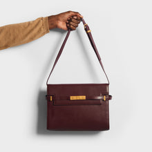 Load image into Gallery viewer, Model of the SAINT LAURENT Manhattan Leather Shoulder Bag in Bordeaux