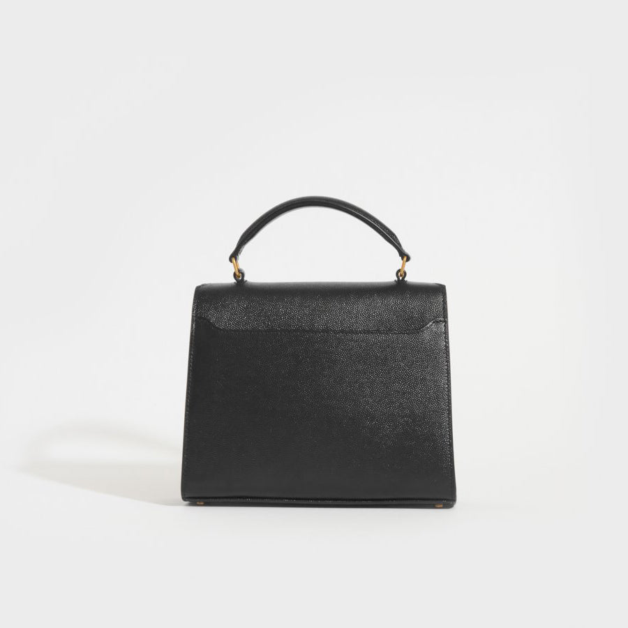 Mini Cassandra Grain De Poudre Embossed Leather Bag in Black
