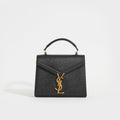 Mini Cassandra Grain De Poudre Embossed Leather Bag in Black