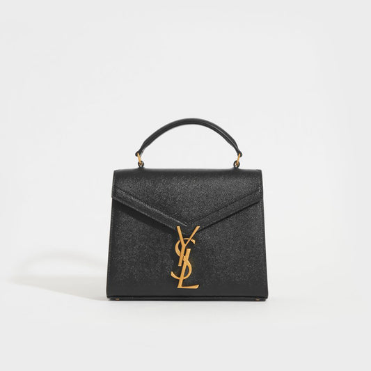 Mini Cassandra Grain De Poudre Embossed Leather Bag in Black
