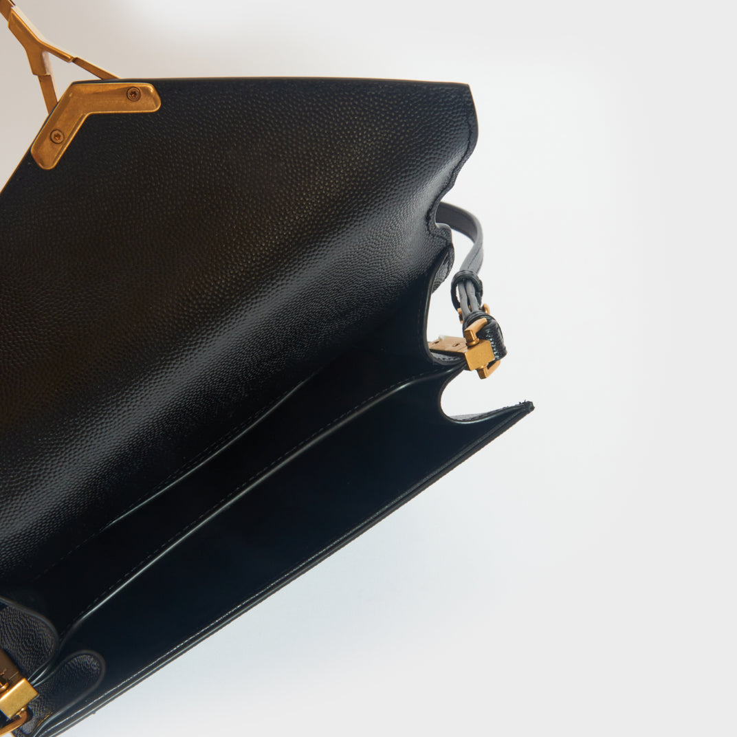 Mini Cassandra Grain De Poudre Embossed Leather Bag in Black