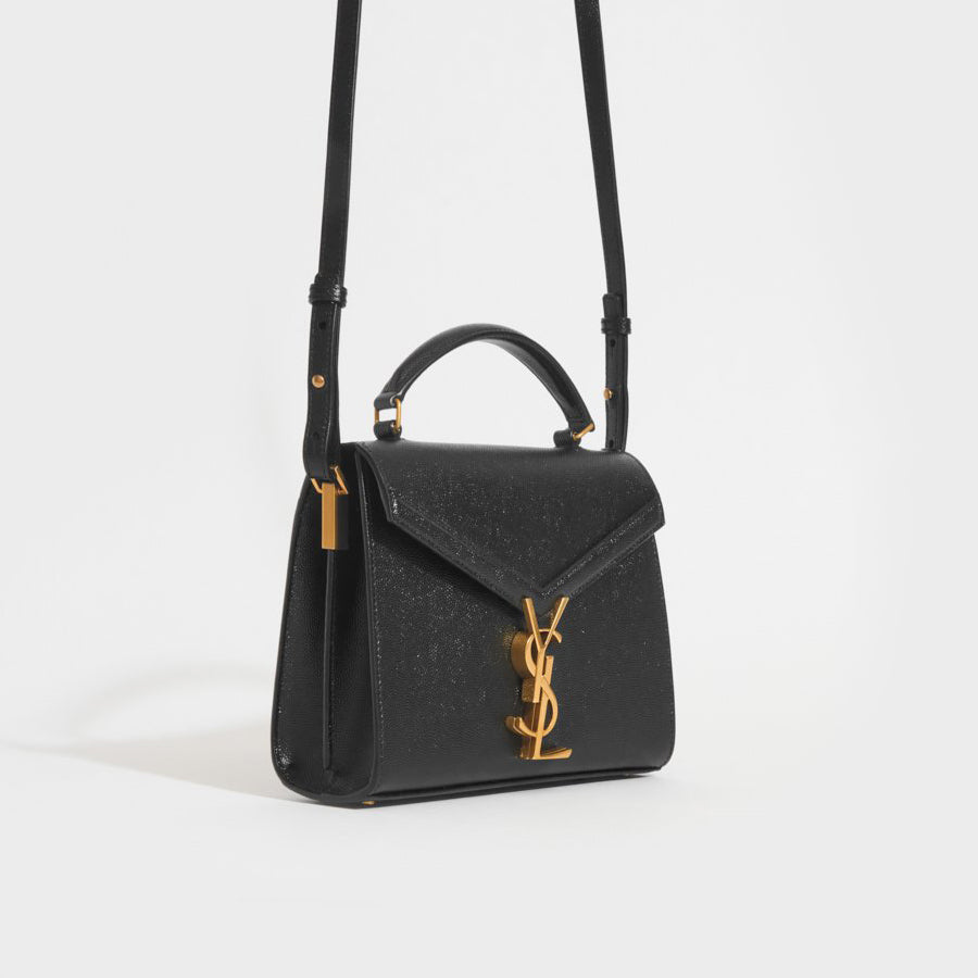 Mini Cassandra Grain De Poudre Embossed Leather Bag in Black