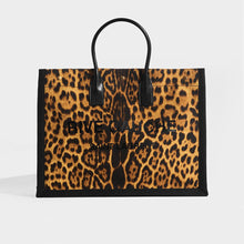 Load image into Gallery viewer, Front of the SAINT LAURENT Rive Gauche Tote Bag in Leopard Print