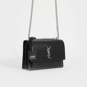 Side view of the SAINT LAURENT Sunset Medium Leather Shoulder Bag in Black