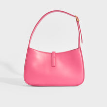 Load image into Gallery viewer, Back view of Saint Laurent Le 5 a 7 leather handbag in bubblegum pink with gold hardware buckle
