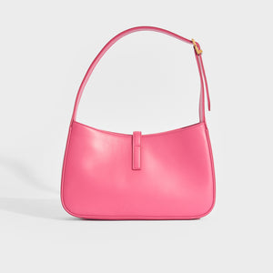 Back view of Saint Laurent Le 5 a 7 leather handbag in bubblegum pink with gold hardware buckle