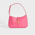 Front view of Saint Laurent Le 5 a 7 leather bag in bubblegum pink with gold hardware