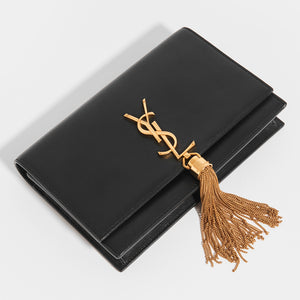 Top view of SAINT LAURENT Kate Tassel Chain Wallet in Black with Gold Hardware
