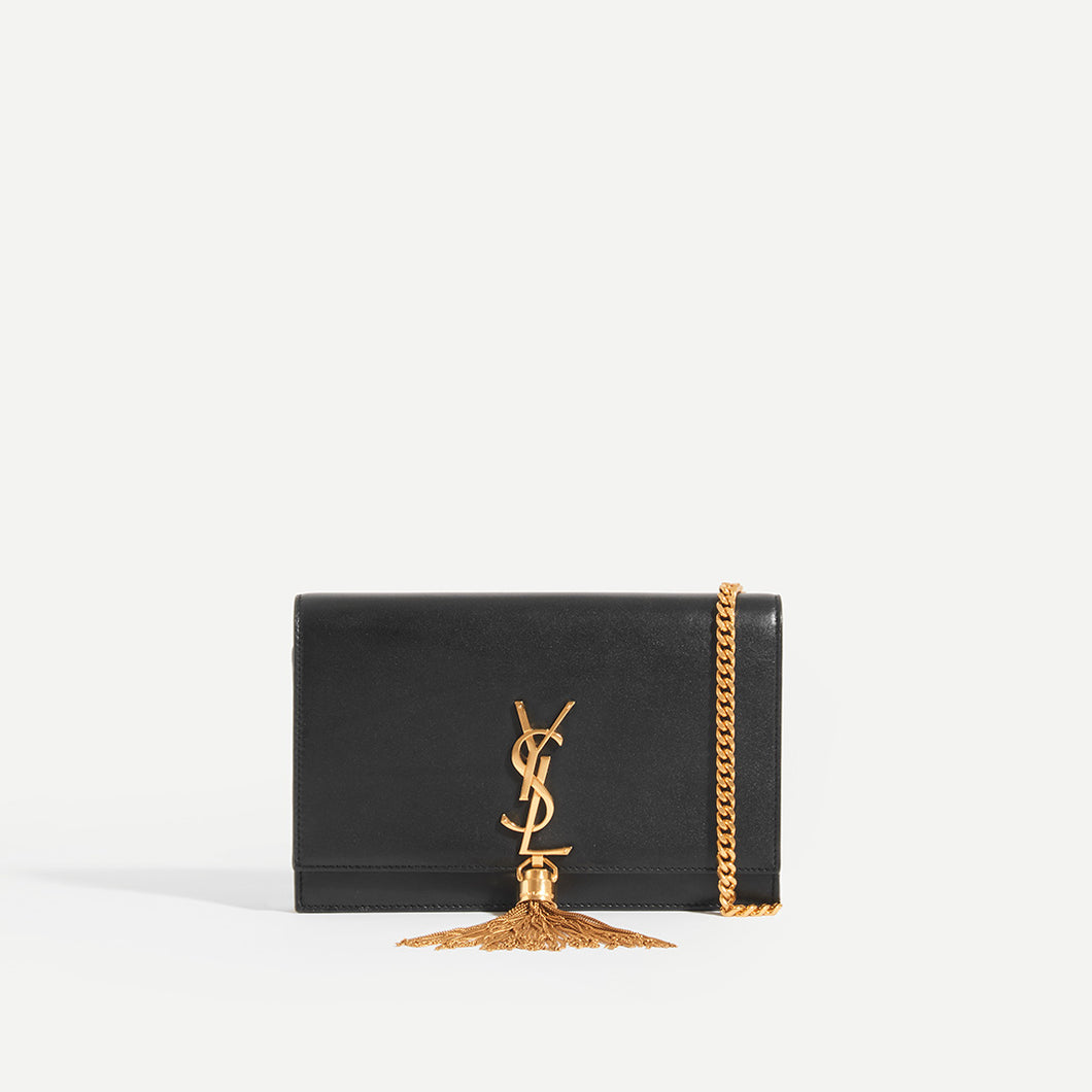 SAINT LAURENT Kate Wallet in Black Leather with Gold Metal Strap, Gold YSL Hardware and Gold Tassel