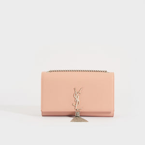 Front view of the SAINT LAURENT Kate Tassel Chain Wallet in Pink