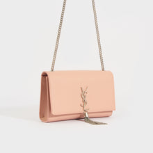 Load image into Gallery viewer, Side view of the SAINT LAURENT Kate Tassel Chain Wallet in Pink