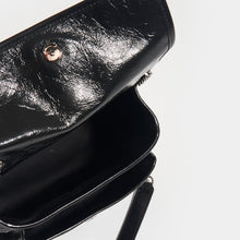 Load image into Gallery viewer, Inside view of SAINT LAURENT Niki Baby in Crinkled Leather in Black