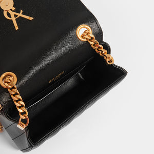 Inside of SAINT LAURENT Vicky Grained Leather Crossbody in Black
