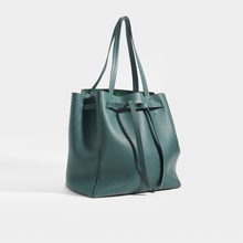 Load image into Gallery viewer, Side view of the CELINE Pre-Loved Cabas Phantom in Soft Grained Calfskin