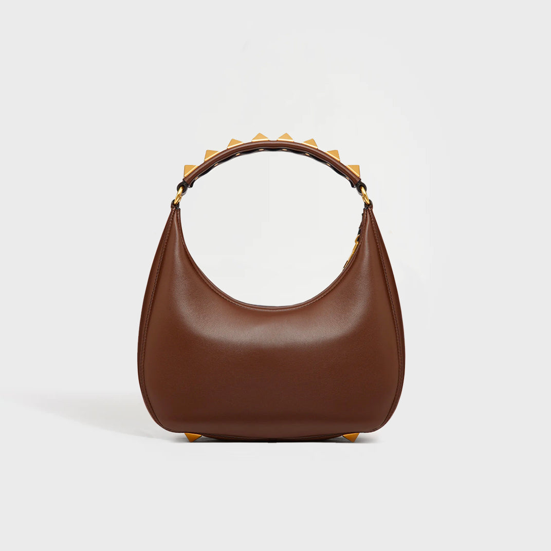 Garavani Roman Stud Sign Leather Shoulder Bag in Brown